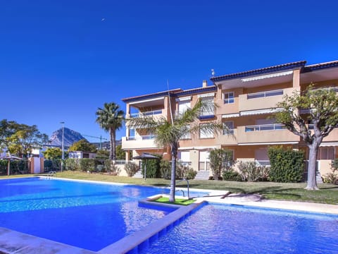 Building, Plant, Water, Sky, Window, Azure, Tree, Blue, Swimming Pool, Condominium
