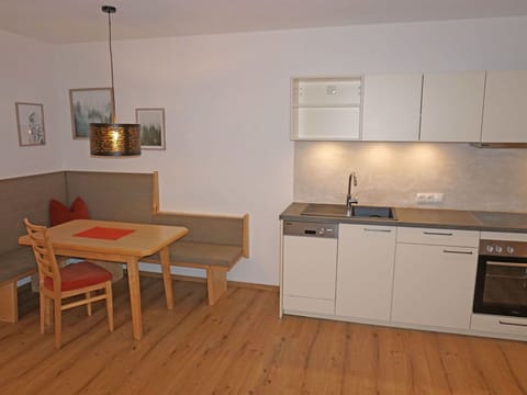 Furniture, Cabinetry, Property, Countertop, Sink, Table, Picture Frame, Wood, Kitchen Stove, Interior Design