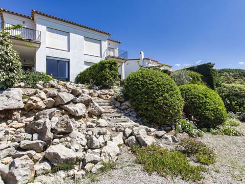 Plant, Sky, Property, Plant Community, Building, Azure, House, Slope, Window, Vegetation
