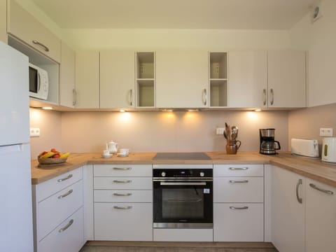 Cabinetry, Countertop, Property, Building, Kitchen Stove, Drawer, Wood, Kitchen, Interior Design, Kitchen Appliance