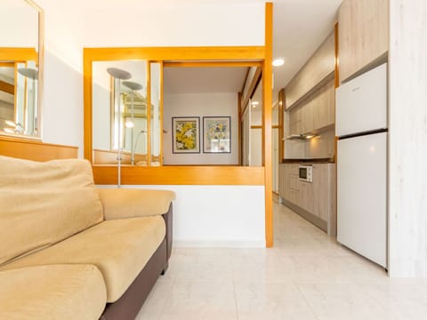 Couch, Orange, Wood, Comfort, Flooring, Floor, Building, Door, Real Estate