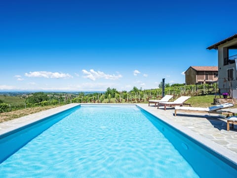 Water, Sky, Plant, Cloud, Swimming Pool, Blue, Azure, Building, Shade, Outdoor Furniture