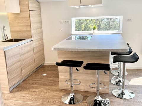 Furniture, Property, Table, Product, Building, Interior Design, Lighting, Rectangle, Wood, Cabinetry