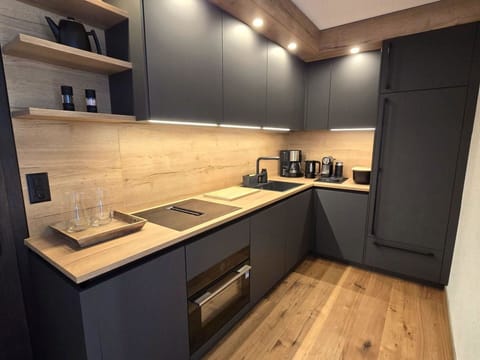 Wood, Kitchen, Kitchen Appliance, Flooring, Countertop, Interior Design, Home Appliance, Cabinetry, Furniture, Major Appliance