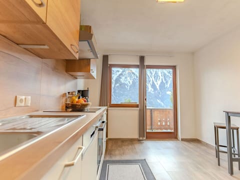 Wood, Interior Design, Ceiling, Room, Wood Stain, Hardwood, Wood Flooring, Apartment, Cabinetry, Chair