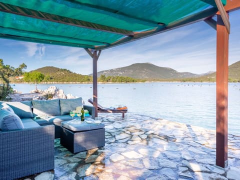 Sky, Building, Table, Window, Outdoor Furniture, Urban Design, Wood, Shade, Condominium, House