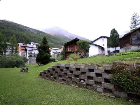 Plant, Sky, Building, Tree, Mountain, House, Land Lot, Grass, Highland, Natural Landscape