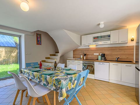 Furniture, Cabinetry, Countertop, Plant, Table, Chair, Lighting, Building, Wood, Architecture