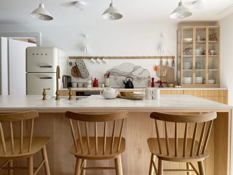 Table, Furniture, Cabinetry, Countertop, White, Kitchen, Wood, Shelf, Chair, Lighting