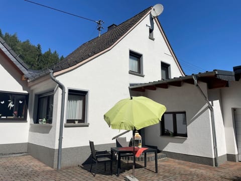 Sky, Building, Property, Window, Shade, Plant, House, Umbrella, Architecture, Cottage