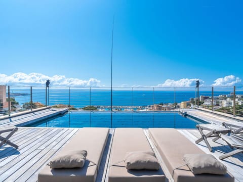 Water, Sky, Cloud, Property, Swimming Pool, Blue, Azure, Sunlounger, Shade, Outdoor Furniture