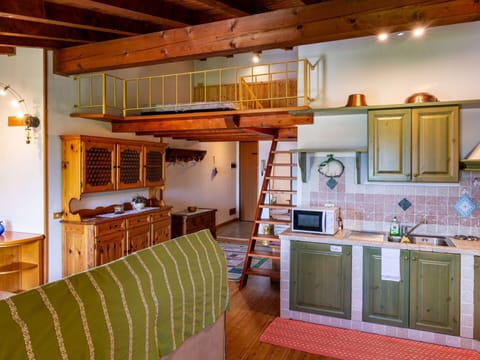 Property, Furniture, Cabinetry, Wood, Interior Design, Countertop, Table, Couch, Floor, Flooring