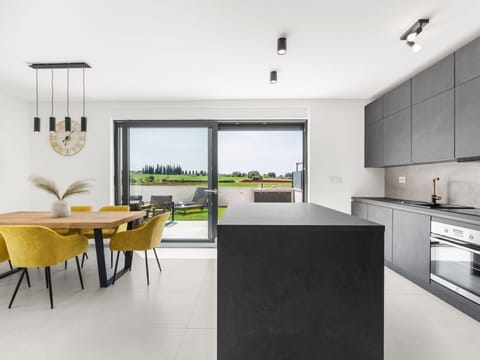 Cloud, Table, Sky, Furniture, Property, Chair, Building, Water, Outdoor Furniture, Interior Design