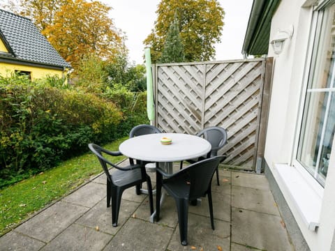Plant, Property, Furniture, Table, Window, Building, Tree, Yellow, Outdoor Furniture, Outdoor Table