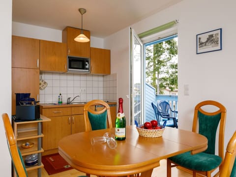 Table, Furniture, Property, Cabinetry, Chair, Bottle, Wood, Countertop, Interior Design, Lighting