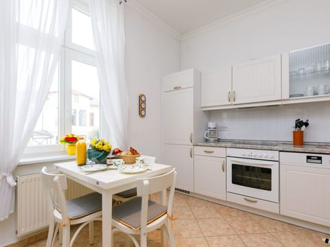 Cabinetry, Property, Window, Countertop, Curtain, Kitchen Stove, Interior Design, Floor, Table, Home Appliance
