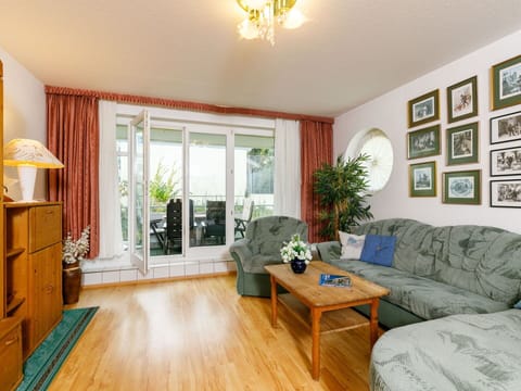 Furniture, Property, Couch, Plant, Picture Frame, Table, Houseplant, Wood, Cabinetry, Lighting