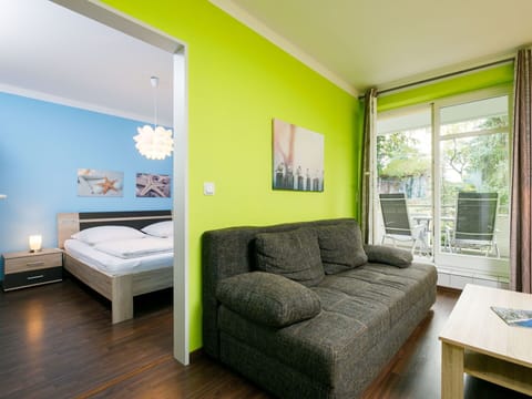 Furniture, Building, Picture Frame, Comfort, Green, Azure, Wood, Interior Design, Lighting, Couch