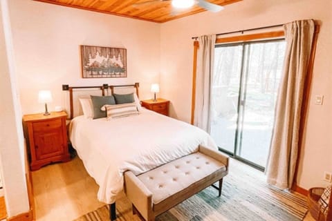 Spacious queen size bed comfortably sleeps 2.