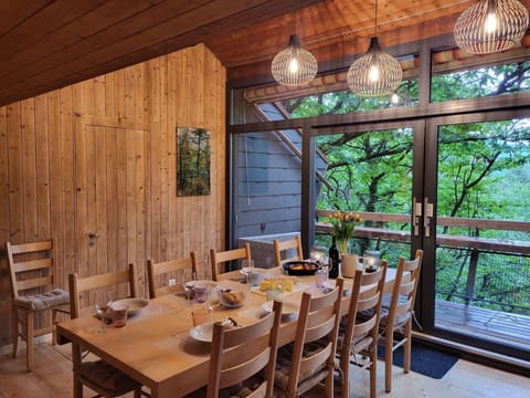 Table, Furniture, Property, Chair, Wood, Tableware, Interior Design, Lighting, Window, Plant