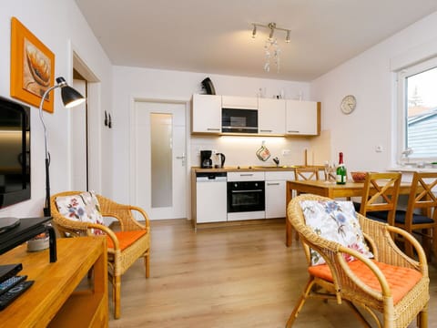 Furniture, Property, Table, Wood, Home Appliance, Couch, Orange, Living Room, Interior Design, Cabinetry