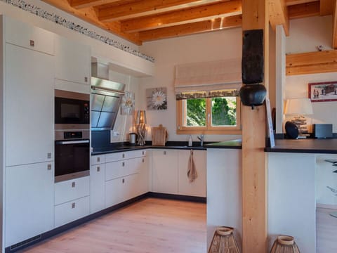 Tableware, Sky, Table, Property, Plant, Furniture, Building, Cloud, Dishware, Cup