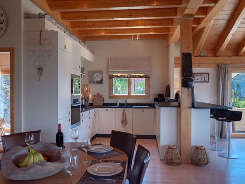 Tableware, Sky, Table, Property, Plant, Furniture, Building, Cloud, Dishware, Cup