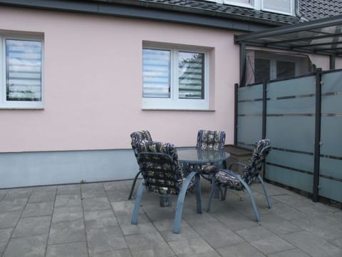 Daytime, Window, Furniture, Building, Chair, Wood, Road Surface, Table, Shade, Brickwork