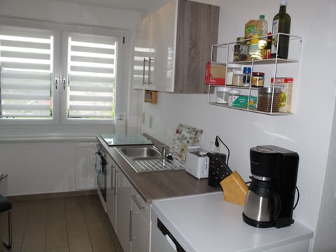 Property, Cabinetry, Kitchen Sink, Window, Countertop, Kitchen Appliance, Sink, Kitchen Stove, Interior Design, Kitchen