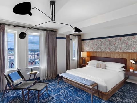 Wake up to skyline views in a sunlit king retreat