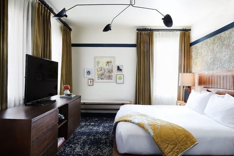 Relax after exploring with cozy bedding and in-room entertainment