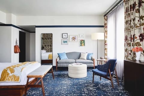 Stretch out in your airy suite with cozy lounge seating.