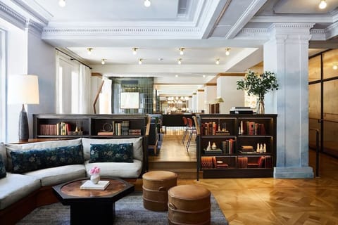 Linger over conversation in this elegant, library-lined lounge