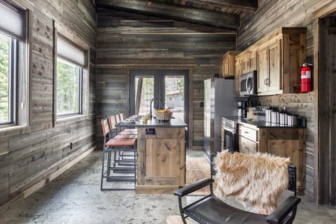 Savor meals in the delightful dining area. With ample seating and charming decor, it's the perfect spot to gather and enjoy delicious food in a cozy atmosphere.