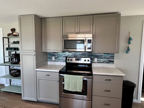 Full, beautifully remodeled modern kitchen with all the amenities. 