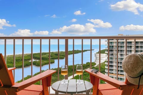 Enjoy a glass of wine or morning coffee from the balcony overlooking the Gulf