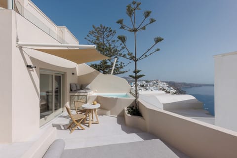 Private balcony with partial sea view and hot tub