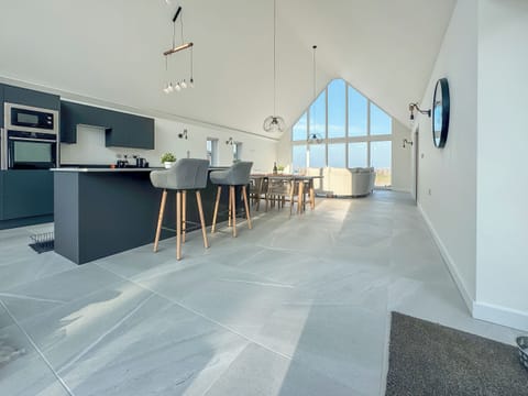 Very spacious open plan kitchen, living and dining room, with amazing sea views, great for enjoying family time together. | Seafields, Sidestrand