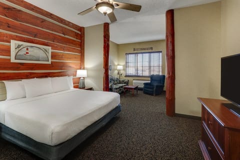 Unwind in crisp linens with warm rustic cabin accents.