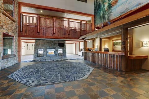 Step into the rustic lobby and unwind by stone charm.