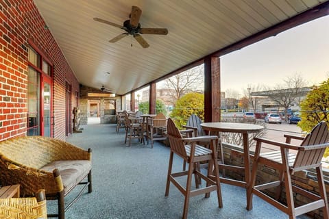 Sip morning coffee on the covered porch with open-air seating.