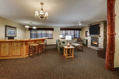 Sip morning coffee at the bar in this open, airy suite.