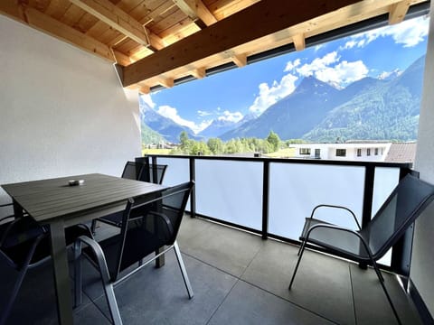 Furniture, Property, Table, Building, Shade, Interior Design, Architecture, Floor, House, Sky