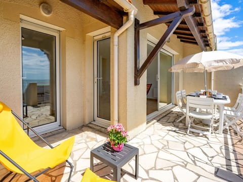 Sky, Property, Table, Furniture, Chair, Water, Umbrella, Azure, Outdoor Furniture, Shade