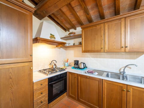 Wood, Kitchen, Interior Design, Cabinetry, Flooring, Major Appliance, Kitchen Appliance, Room, Countertop, Floor