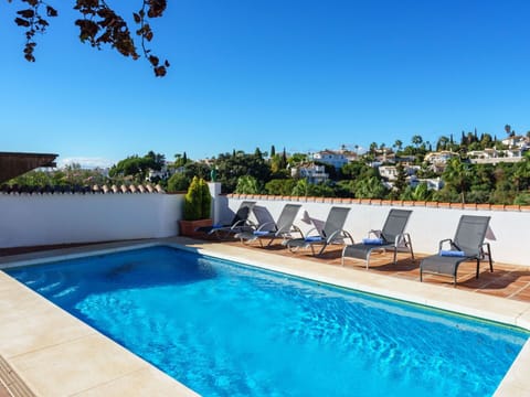 Water, Plant, Sky, Property, Swimming Pool, Azure, Shade, Outdoor Furniture, Tree, Chair