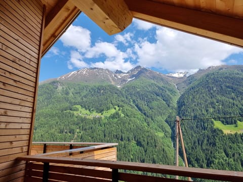 Cloud, Sky, Property, Ecoregion, Mountain, Nature, Wood, Architecture, Shade, Highland