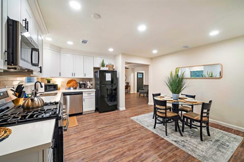 Dining Area: Savor meals in style with a chic table and bright, airy ambiance!