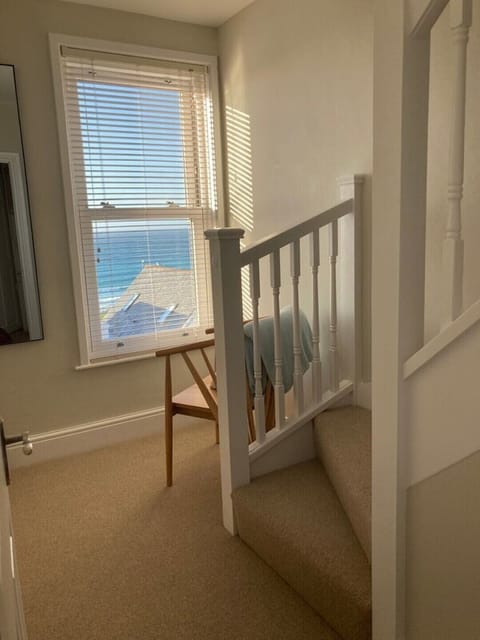 Room giving access to second floor. Offers a small quiet area with sea views.