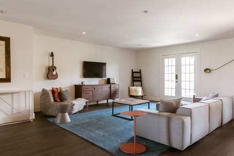 Unwind on the spacious sofa for movies and easy lounging.